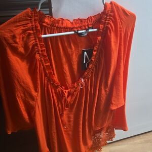 Elegant Orange Blouse with Lace Detail